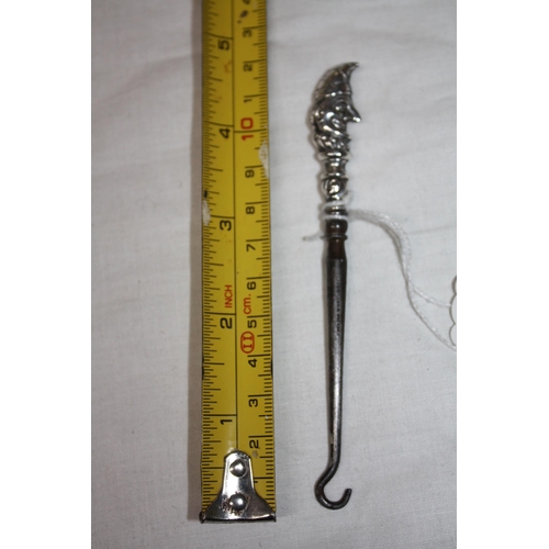 1140 - Silver handled button hook 1904