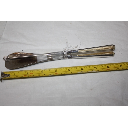 1145 - Matching silver handled shoe horn & button hook