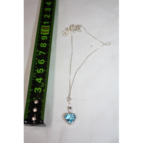 1184 - Silver blue topaz heart pendant