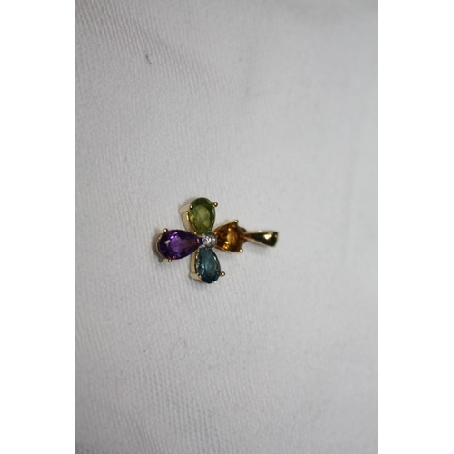 1185 - 14k gold multi gem pendant 1.5 grammes all in