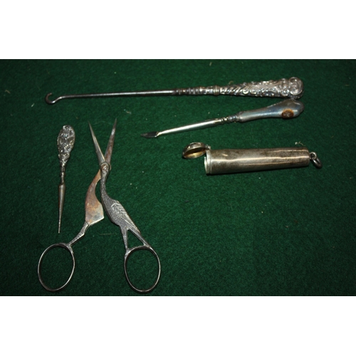 1262 - Silver needle case, 2 silver button hooks & white metal hook & scissors