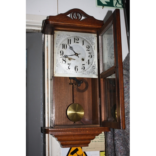 1466 - Oak cased wall clock with pendulum & key 25 1/2