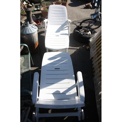 71 - Pair of plastic loungers