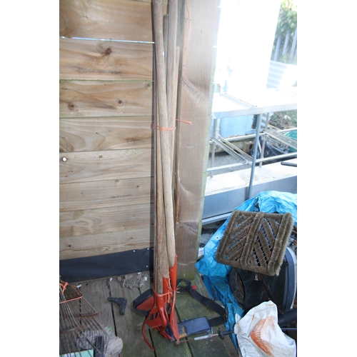 74 - Red headed long handled garden tools