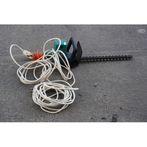 103 - Black & Decker hedgetrimmer with long extension lead