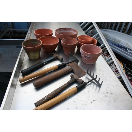 108 - Group of terraotta pots, axe etc