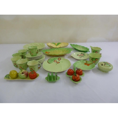 105 - A quantity of Carltonware to include dishes, cups, saucers, plates and condiments (31)