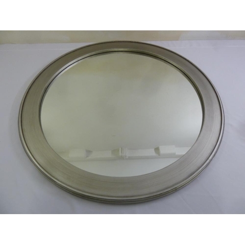 30 - A circular silvered wood frame wall mirror, 100cm diameter