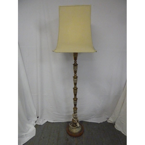 32 - A brass standard lamp in the Chinese style with rectangular silk shade