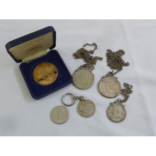 467 - A quantity of coins in pendant settings and two other coins (6)