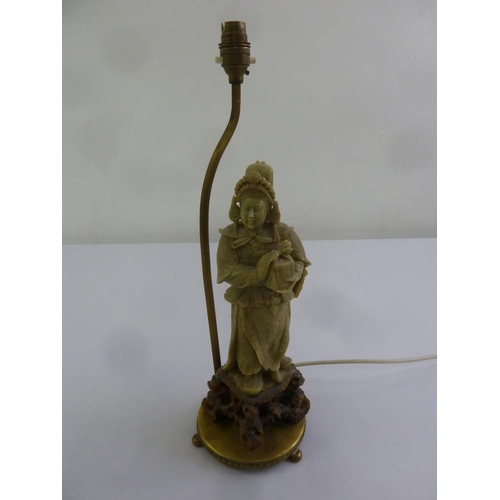 33 - A Chinese hardstone carving of a lady on raised circular base converted to a table lamp