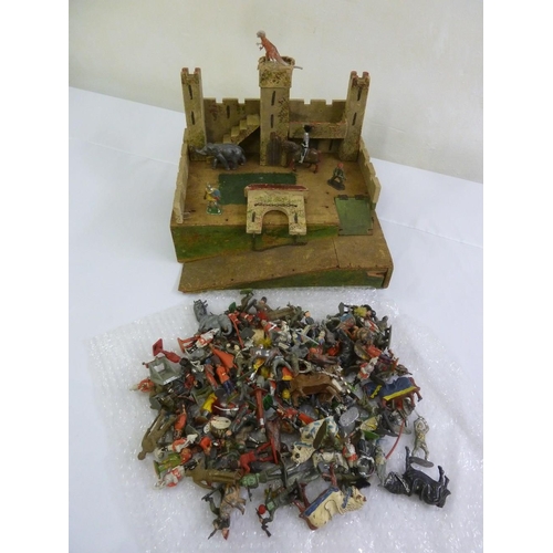 426 - A quantity of lead figurines and a wooden fort, circa 1950