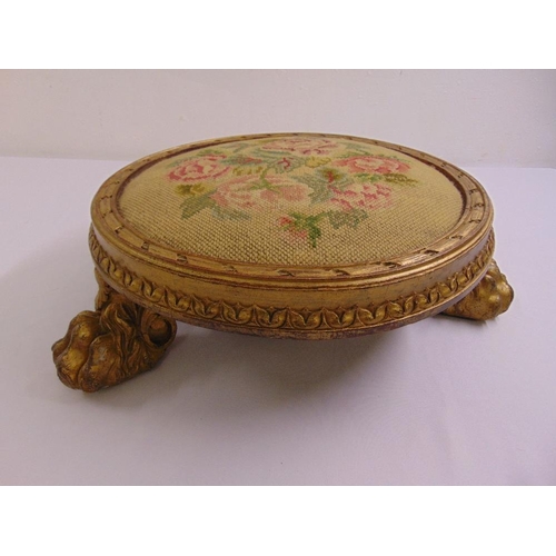 38 - A Regency circular gilded wooden embroidered foot stool