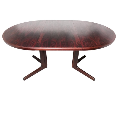 15 - A mid 20th century Rosewood circular pedestal dining table by Gudme Møbelfabrik of Denmark on tubula... 