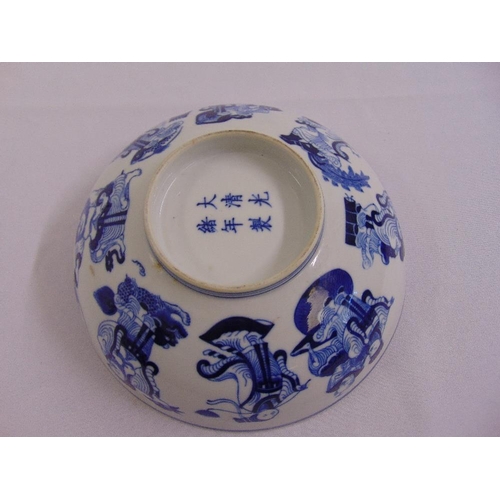 175 - A Chinese blue and white bowl decorated with an elder to the centre, marks to the base A/F