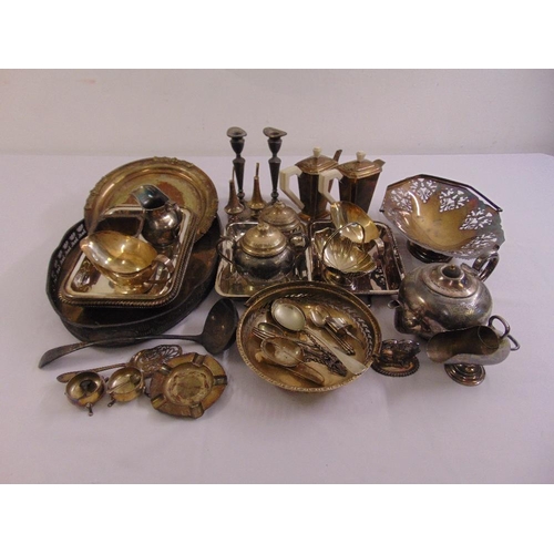 498 - A quantity of silver plate to include candlesticks, dishes and flatware