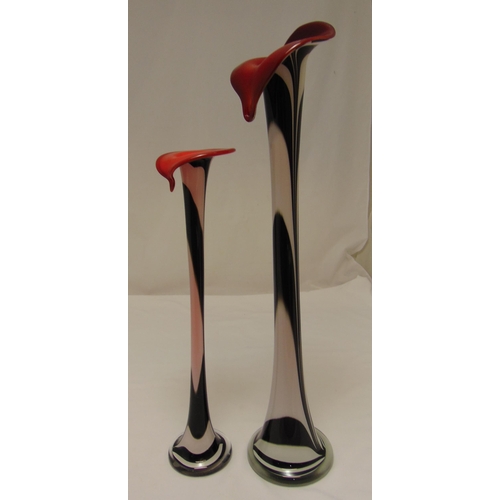 137 - Two Murano glass long stem vases of tubular form on circular spreading bases decorated to the sides ... 