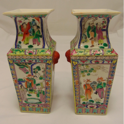 147 - A pair of tapering rectangular Chinese vases decorated with figures to the sides within geometric bo... 