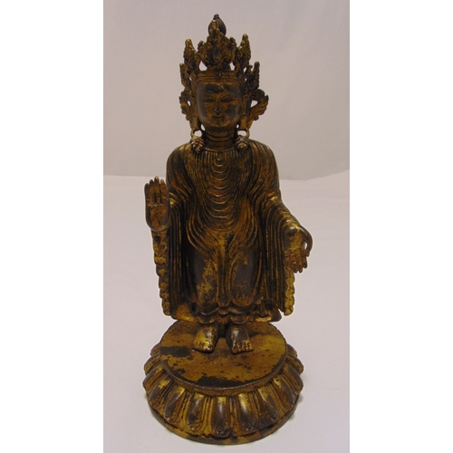 165 - A Chinese gilded bronze Buddha on raised circular base, 31cm (h)