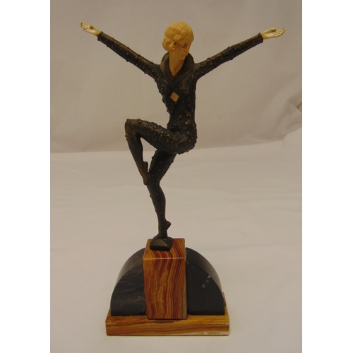 177 - An Art Deco figurine of dancing lady in the style of Chiparus on an oval polychromatic marble stand,... 