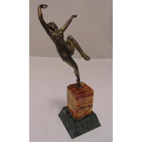 178 - An Art Deco style figurine of a dancing lady in full flow on rectangular marble base, 34cm (h)