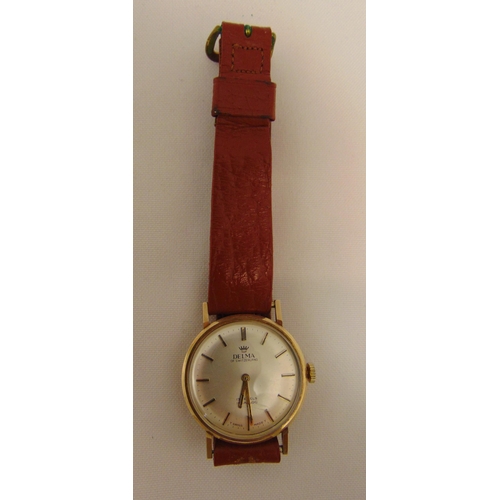 264 - Delma 9ct gold gentlemans wristwatch on a replacement leather strap