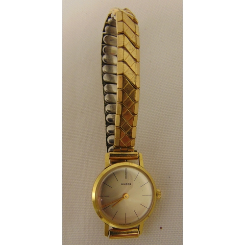 267 - Huber 9ct gold ladies wristwatch on a gold plated expanding bracelet