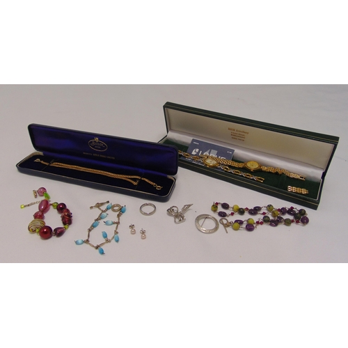 282 - A quantity of costume jewellery to include necklaces, a ring, a brooch and wristwatches