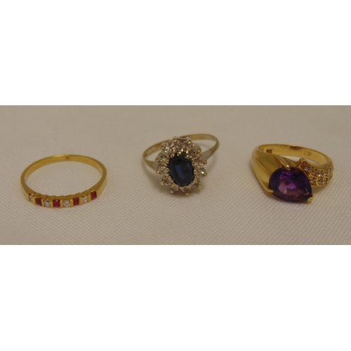 305 - Three 18ct gold rings set with various stones, approx total weight 9.4g