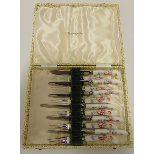 94 - A cased set of Royal Crown Derby porcelain handled dessert eaters for six place settings