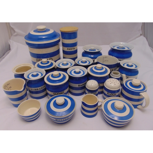 124 - T.G. Green blue and white Cornishware kitchen containers to include jars with covers, a teapot, jugs... 
