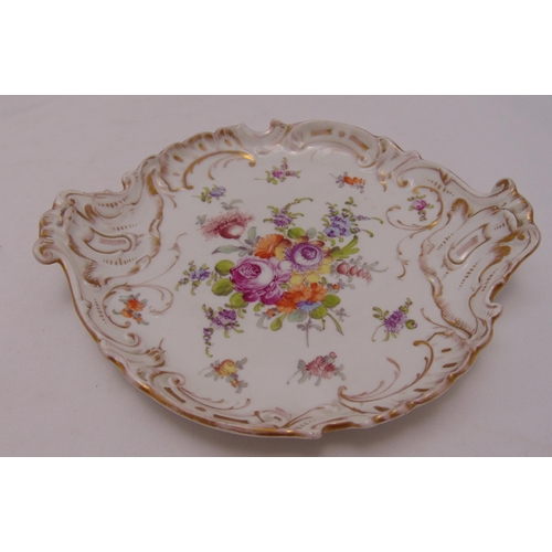 133 - A Dresden cake plate of shaped oval form decorated with floral sprays and gilded leaf and scroll det... 