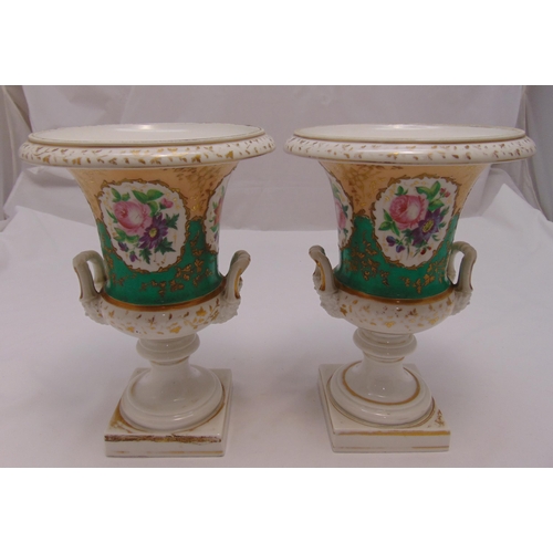 137 - A pair of continental campagna form vases decorated with flowers on raised square bases, 34cm (h)