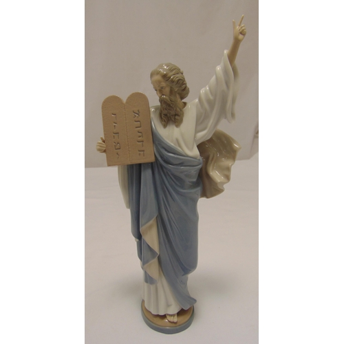 178 - Lladro figurine of Moses holding the Ten Commandments on circular base, marks to the base, 41cm (h)
