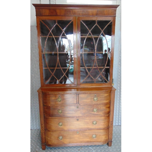 10 - A 19th century mahogany breakfront bookcase with astral glazed double door cupboard, five drawers wi... 