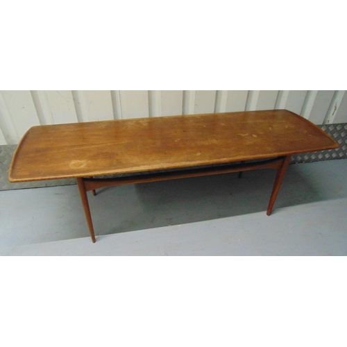 15 - A mid 20th century rectangular teak coffee table on four tapering cylindrical legs, 47 x 150 x 52.5c... 