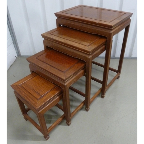 19 - A Chinese rectangular hardwood nest of four tables, tallest 66 x 51 x 36cm