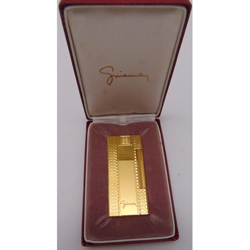 247 - Givenchy 2000 gilded cigarette lighter in original packaging