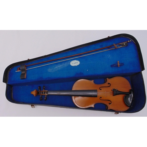 249 - A childs violin and bow in fitted case