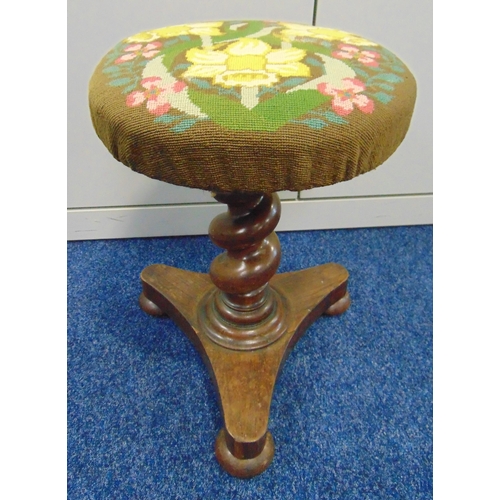 36 - A Victorian rise and fall piano stool with barley twist column on triform base with embroided seat, ... 