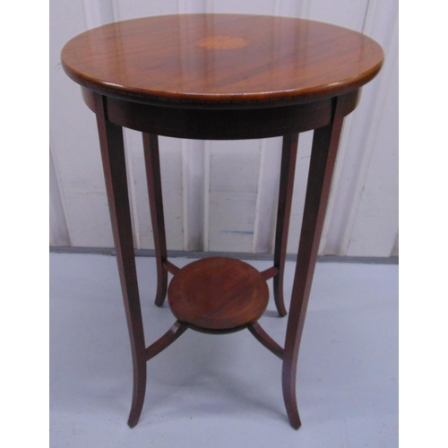 12 - An Edwardian mahogany inlaid circular occasional table on four outswept legs, 70 x 44cm