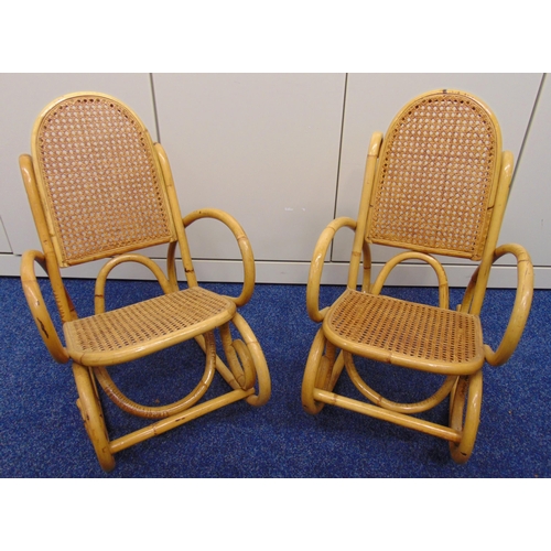 24 - A pair of bamboo childrens rocking chairs with bergere seats and backs