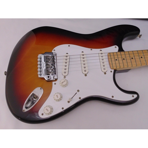 272 - Fender Stratocaster electric guitar in fitted case to include strap and accessories