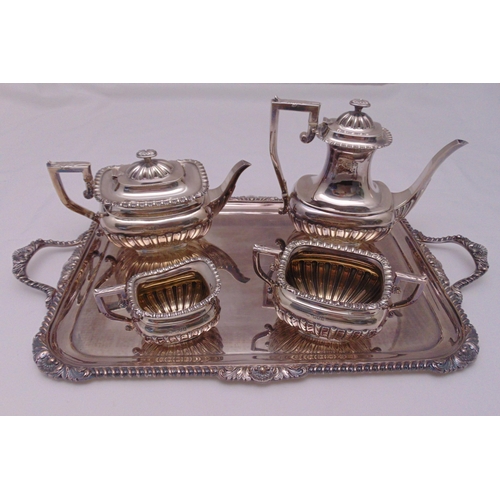 391 - A four piece hallmarked silver tea and coffee set rounded rectangular part fluted with gadrooned bor... 