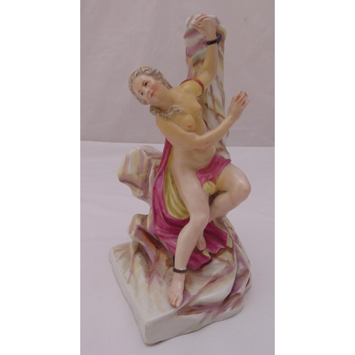 170 - Meissen style figurine of a semi naked lady tied to the rocks on naturalistic base, marks to the bas... 