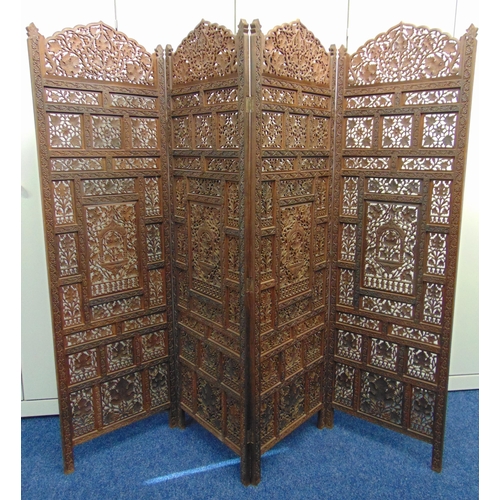 19 - An oriental four panel wooden carved and pierced screen, each panel 173 x 52 x 2cm