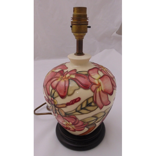 27 - A Moorcroft table lamp of baluster form decorated with pink flowers on raised hardwood base, 29cm (h... 