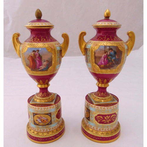 106 - A pair of Vienna vases with gilded side handles, the sides decorated with classical panels, the rais... 