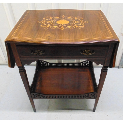 11 - An Edwardian rectangular mahogany two tier table with drop flap sides on tapering rectangular legs, ... 