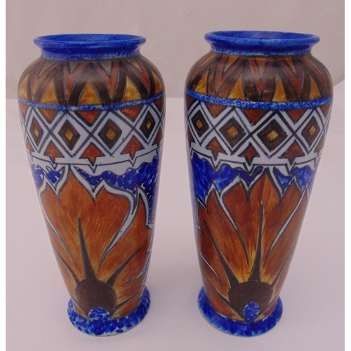 112 - A pair of Chamelion ware polychromatic baluster vases, 22.5cm (h)